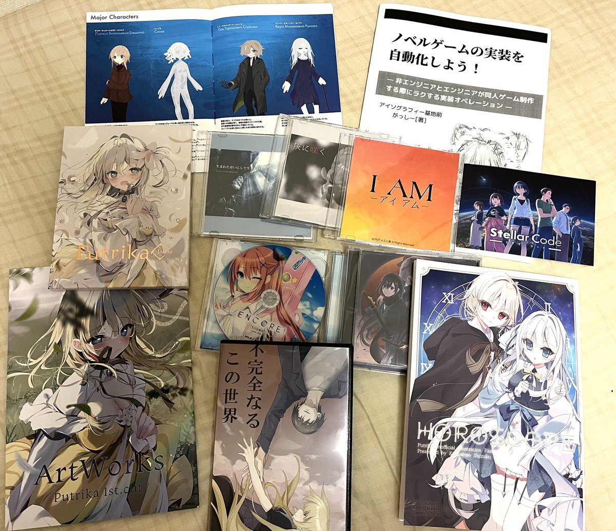 mi_yumeututu's tweet photo. c106で買ったもの（ノベルゲーム関連） https://t.co/wY5vPG2h6V