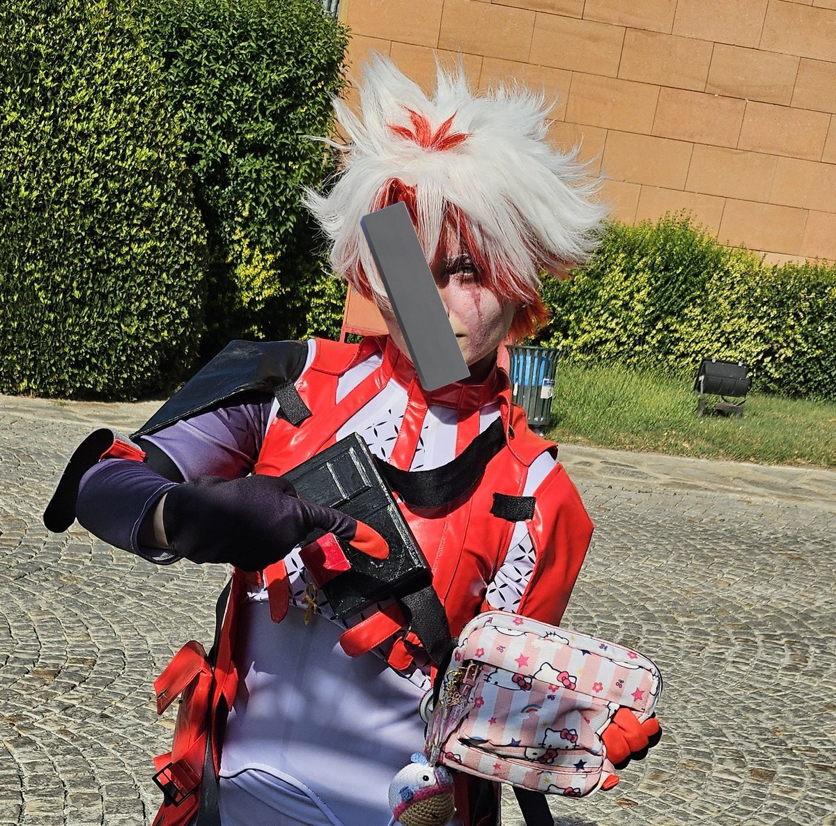 Cosplayed scar with a hello kitty bag.
I think that's pretty much canon