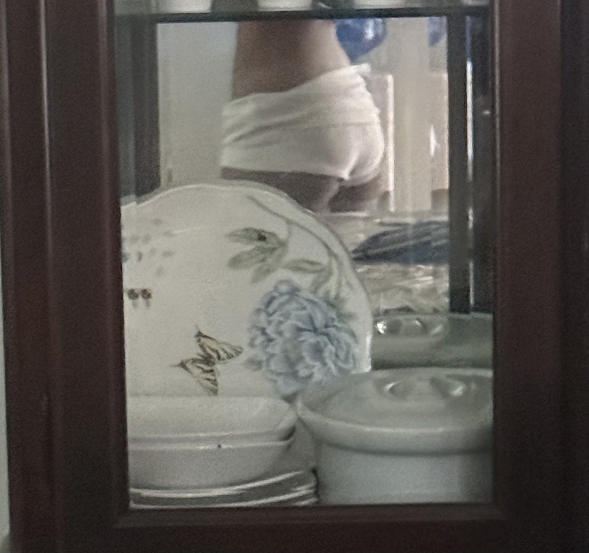 why do i like my reflection in my cabinet and nowhere else