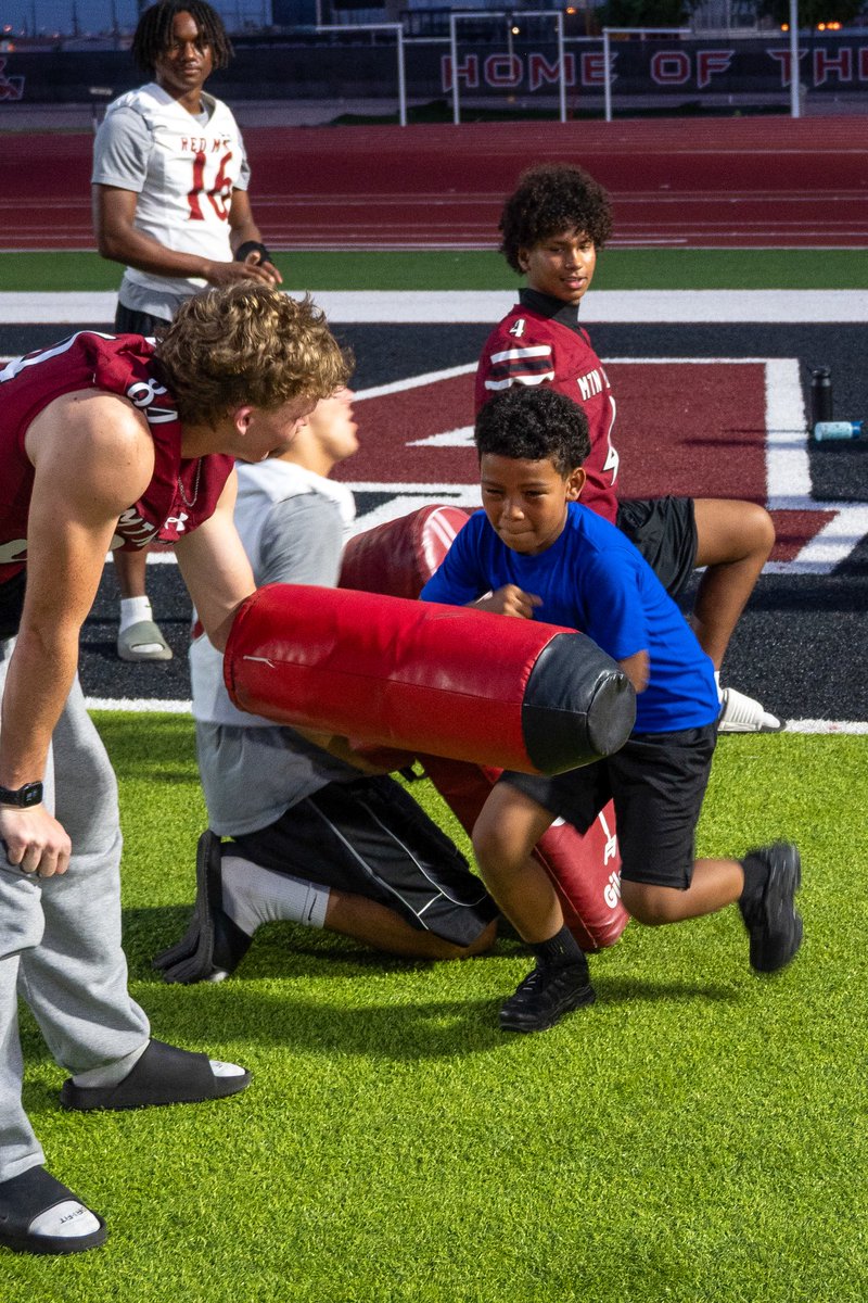 Friday night lights hit different 🏈🔥 Red Mountain’s Youth Camp brought out our future Lions for drills, autographs, photos, and a whole lot of fun! Huge thanks to everyone who came out to rep RM on Jersey Night! 🐾
