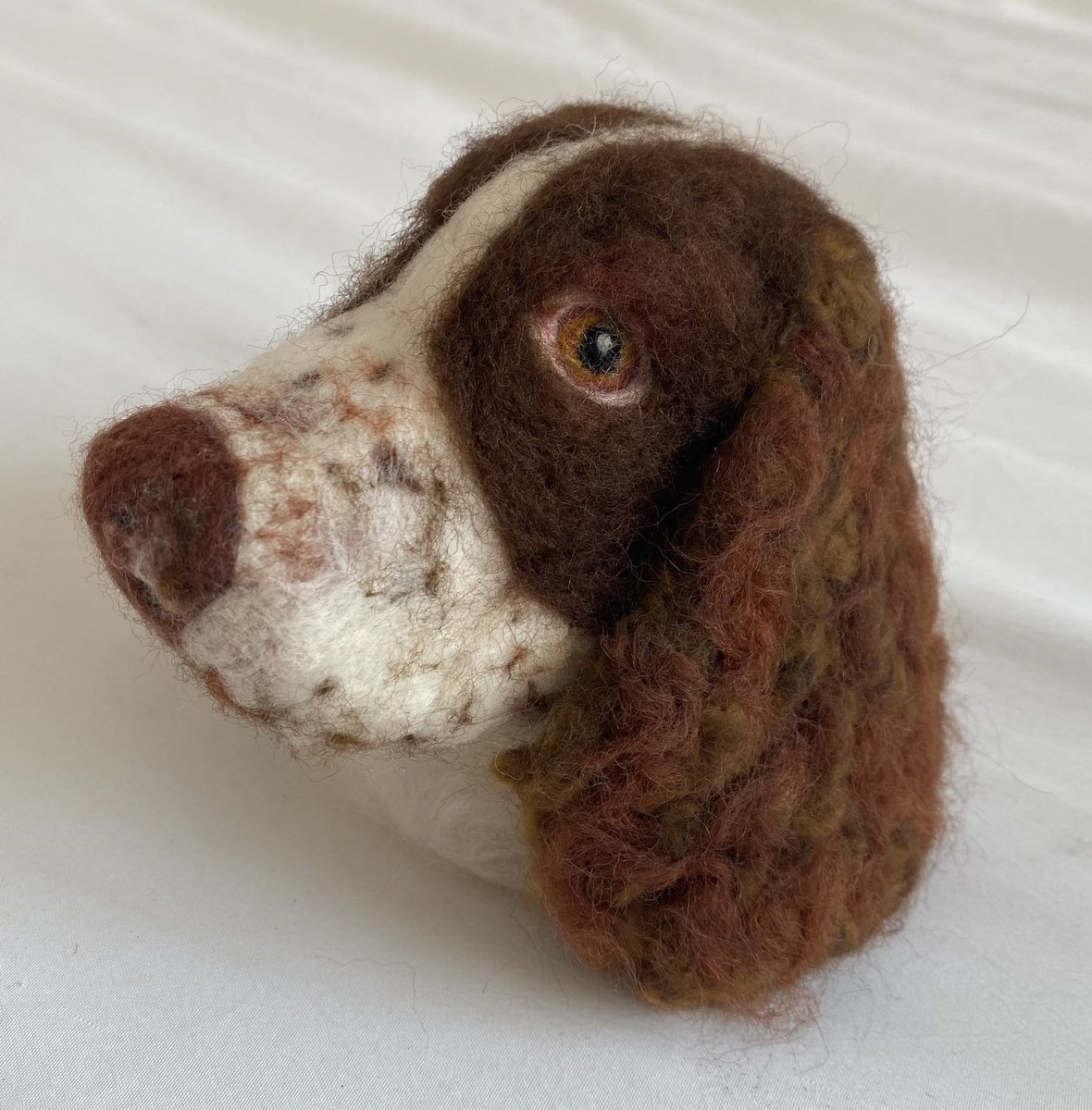 A spaniel that I needle felted. A new hobby of mine. I can also do commissions of your pet 🤩