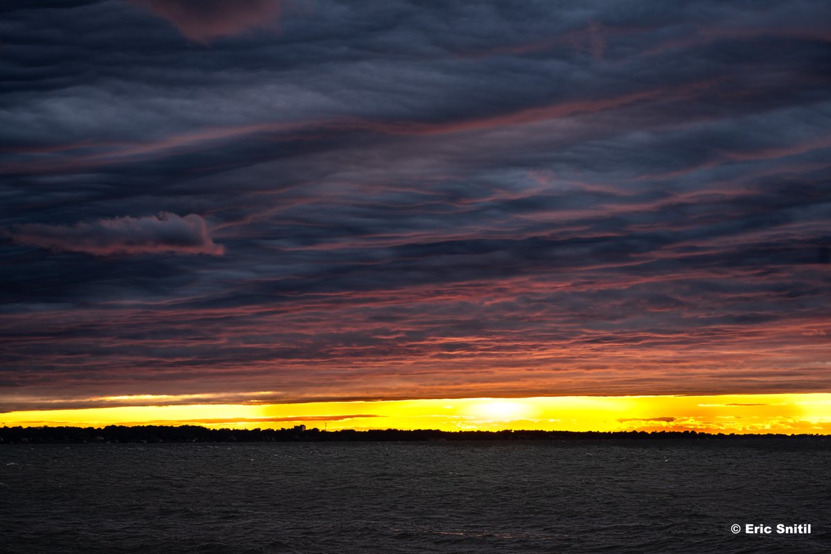 Sometimes, the weather Gods smile down on you. An incredible display of Asperitas clouds turned the sky pink &amp; purple over Lake Ontario this evening. These clouds resemble rippling waves and are particularly striking around sunset. Captured from Webster, New York.