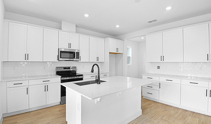 RAHomes's tweet photo. Discover this must-see home for sale in Mt. Dora, FL! Impressive kitchen offering 42'' white cabinets, quartz countertops & a roomy pantry | Beautiful guest suite boasting a living room, a bedroom & a bathroom | Airy loft #HotHomes https://t.co/sLDk82wrHH https://t.co/rEJO1O0g1v