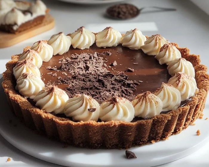 🍫 Scrumptious Milk Chocolate Tart 
#recipe recettemoderne.com/2024/10/05/tar…