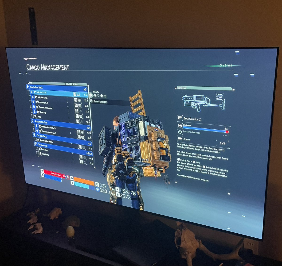 Video games cater to the male fantasy of carrying hundreds of pounds of boxes in the most un-ergonomic way possible