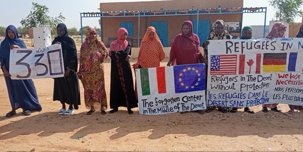 أنا أمريكي (@mohamed66998595) on Twitter photo We don't feel safe here
Agadez is not safe for refugees
Refugees in the desert without protection
Day 330
<a href="/Refugees/">UNHCR, the UN Refugee Agency</a> <a href="/UNarabic/">الأمم المتحدة</a> <a href="/UNGeneva/">United Nations Geneva</a> <a href="/UNHCRNiger/">UNHCR Niger</a> <a href="/_AfricanUnion/">African Union</a> <a href="/UNmigration/">IOM - UN Migration 🇺🇳</a> <a href="/OHCHR_MENA/">UN Human Rights MENA</a> <a href="/afghan_rf/">Afghan Mandate Refugees of UNHCR in Kyrgyzstan</a> <a href="/JFCrisp/">Jeff Crisp</a> <a href="/FermentedDream/">Sharing Afro-Palestinian Voices- See pinned Tweet</a> <a href="/BeltramoPaolo/">Paolo Beltramo</a> <a href="/MeltingPotEU/">Melting Pot Europa</a> We don't feel safe here
Agadez is not safe for refugees
Refugees in the desert without protection
Day 330
<a href="/Refugees/">UNHCR, the UN Refugee Agency</a> <a href="/UNarabic/">الأمم المتحدة</a> <a href="/UNGeneva/">United Nations Geneva</a> <a href="/UNHCRNiger/">UNHCR Niger</a> <a href="/_AfricanUnion/">African Union</a> <a href="/UNmigration/">IOM - UN Migration 🇺🇳</a> <a href="/OHCHR_MENA/">UN Human Rights MENA</a> <a href="/afghan_rf/">Afghan Mandate Refugees of UNHCR in Kyrgyzstan</a> <a href="/JFCrisp/">Jeff Crisp</a> <a href="/FermentedDream/">Sharing Afro-Palestinian Voices- See pinned Tweet</a> <a href="/BeltramoPaolo/">Paolo Beltramo</a> <a href="/MeltingPotEU/">Melting Pot Europa</a>