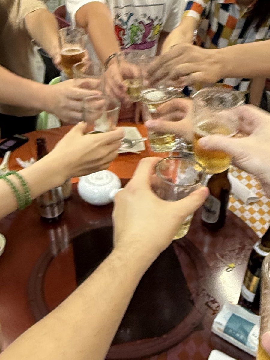 MadLads Chinese community toasting with drinks