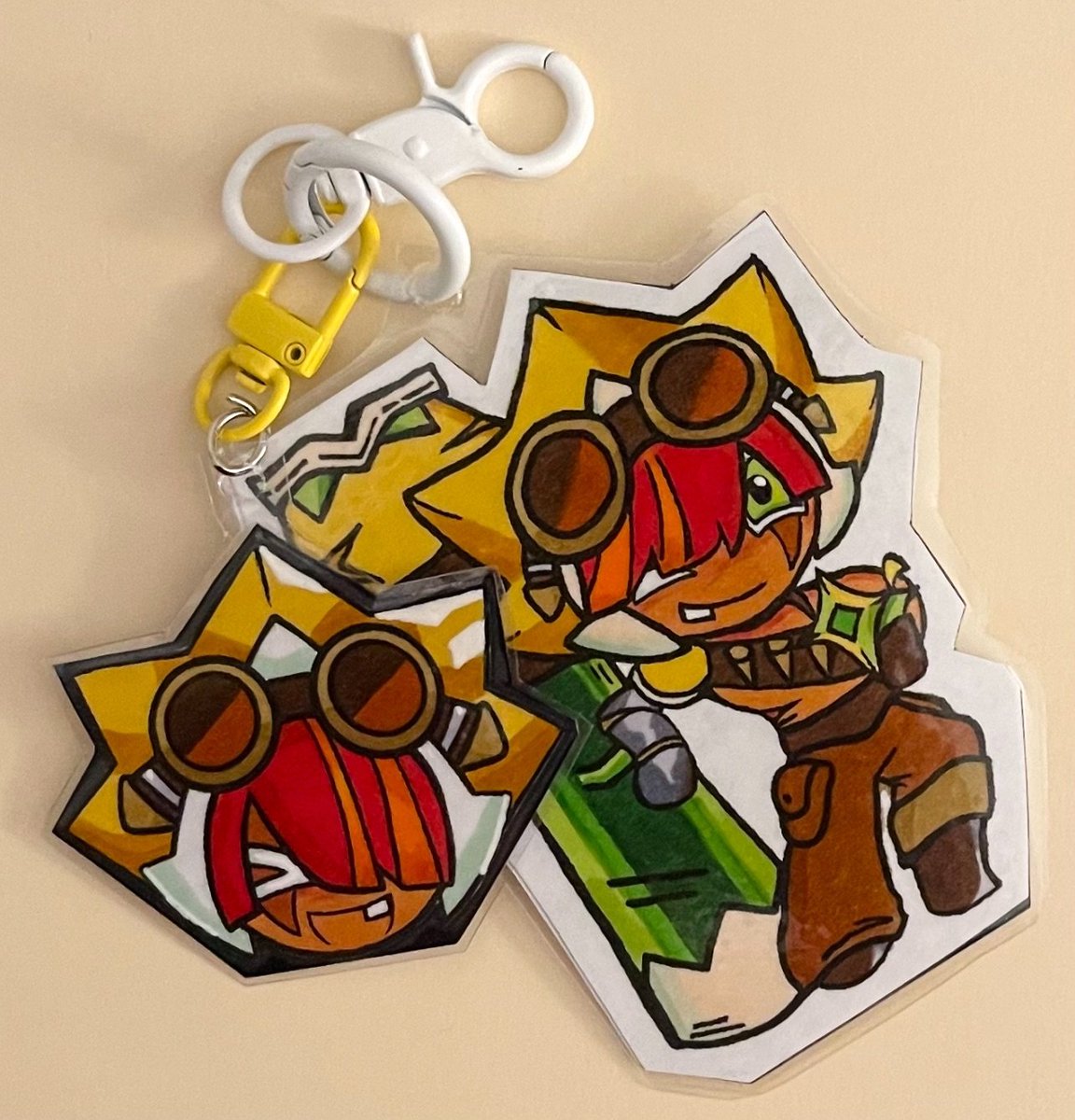 stingboyXP's tweet photo. i tried my best here is sting durian cookie keychain🧡 https://t.co/qc3q92pIfq