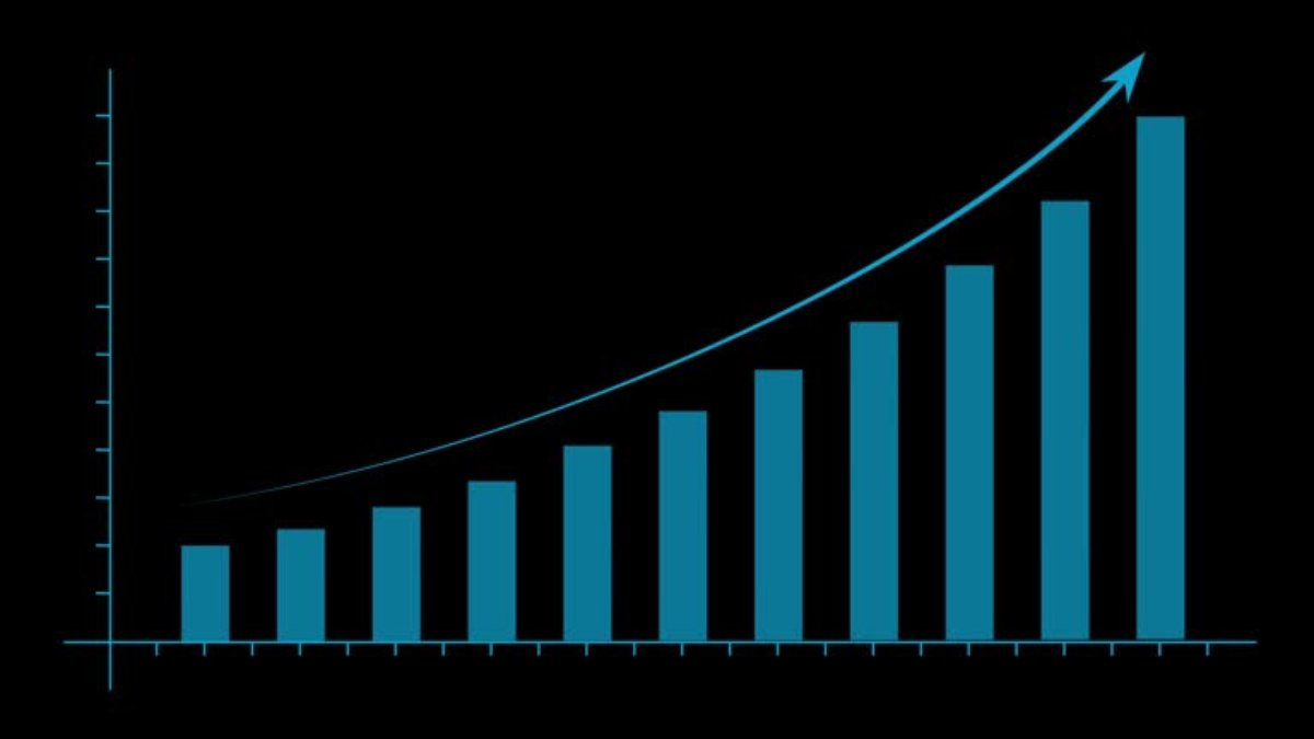 Upward trending bar chart illustrating growth in blue on black background