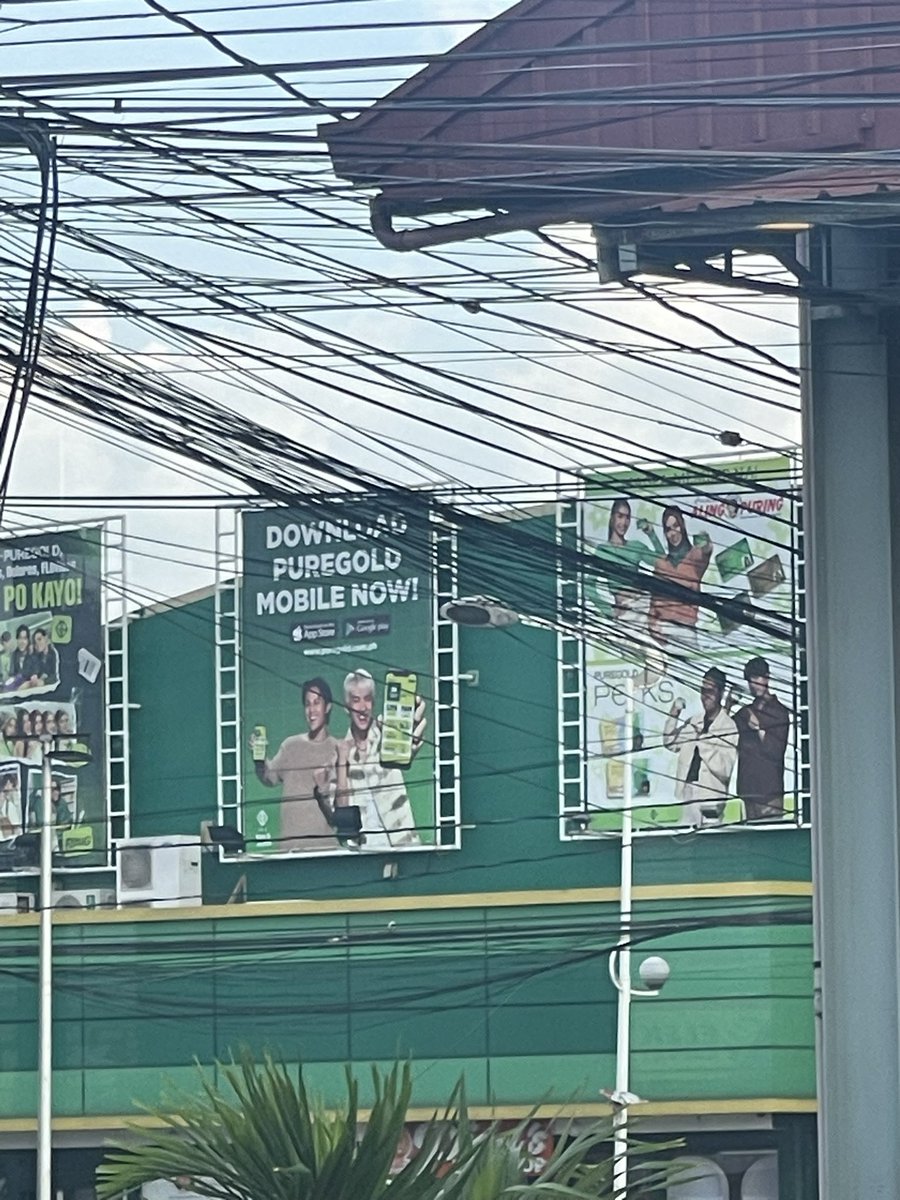 enjahnted's tweet photo. ganito pala sa sta. rosa. maingay, traffic, at may kentin, stelljun, at jhomikha puregold tarp https://t.co/4xeUyqiys7