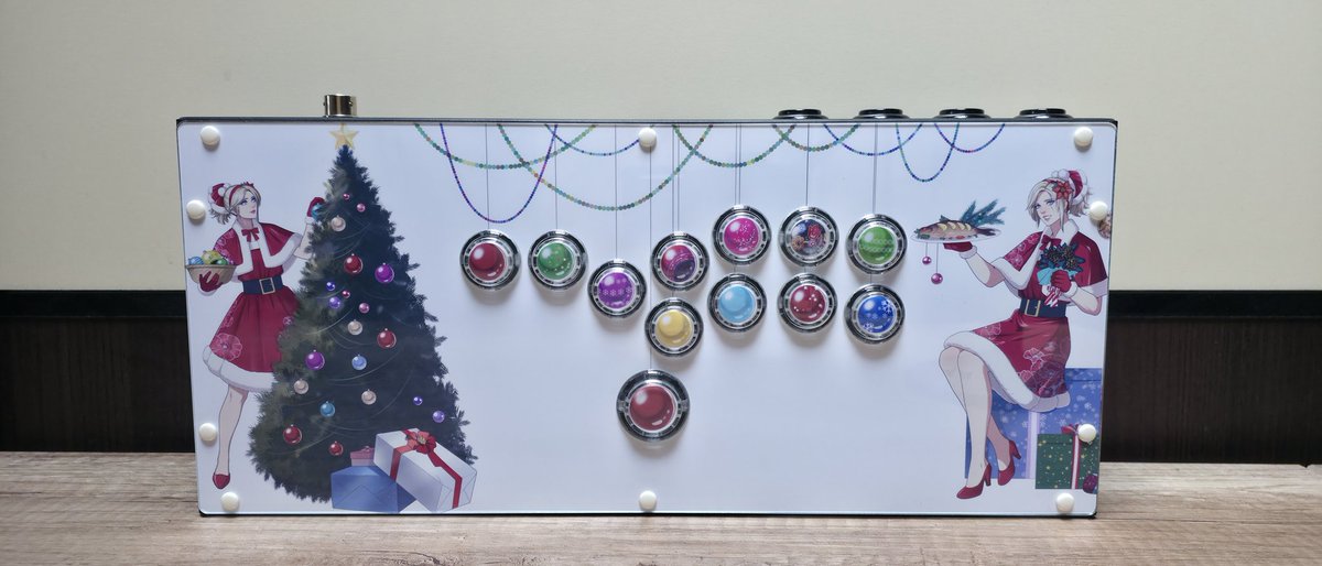 GensenENG's tweet photo. Congratulations to Dawid, the winner of our HitBox giveaway! 

He requested this festive Christmas artwork for his controller — looks like Christmas really did come early this year. 🎁✨

#hitbox #arcade #StreetFighter #Christmas #Custom https://t.co/hl0hzM3Brb