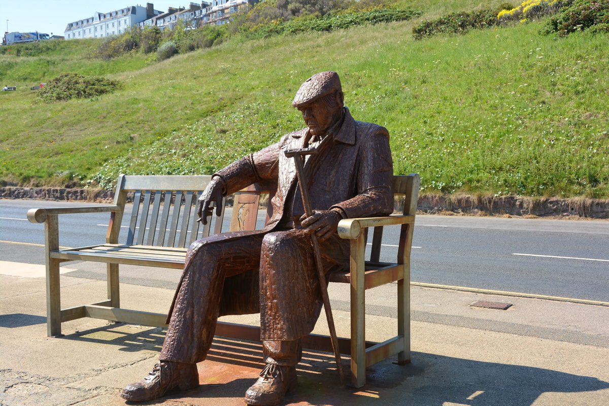 #AlphabetChallenge #WeekHforHats 
Sculptor Ray Lonsdale's statue, a tribute and memorial to    'Freddie Gilroy and the Belsen Stragglers'
They said for king and country
  we should do as we were bid
They said old soldiers never die -
  but plenty young ones did
  At Scarborough