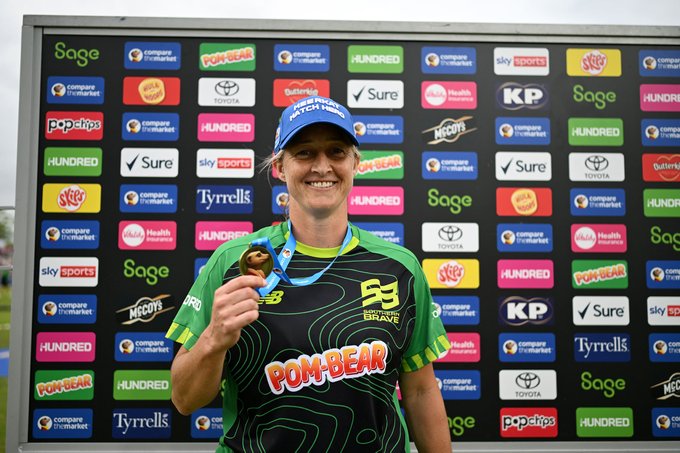 Sophie Devine of Southern Brave poses for a photo with the Meerkat Match Hero cap and medal
©ECB Images