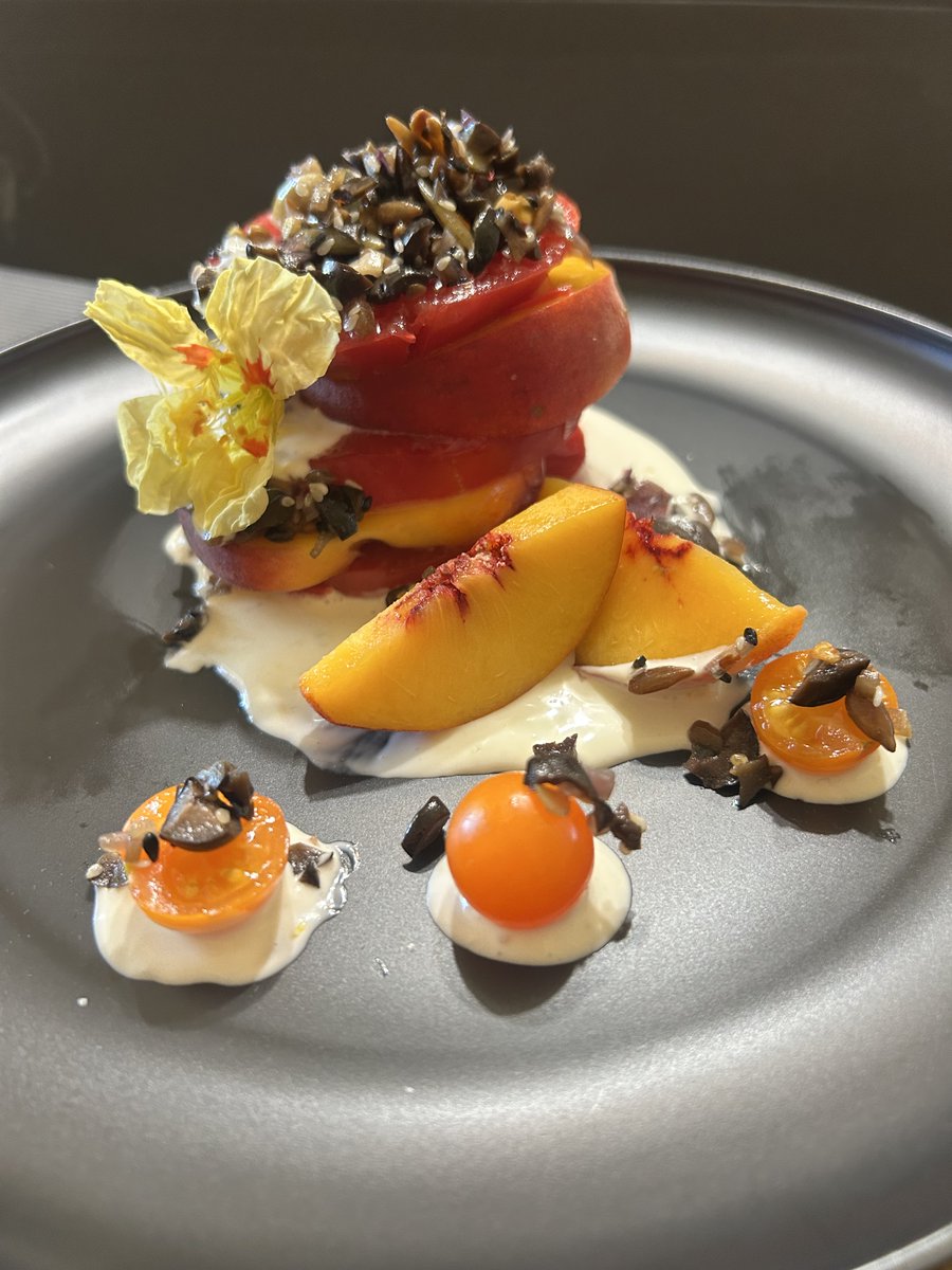 Tomato Peach Stack with Creme Fraiche and Black Olive Granola