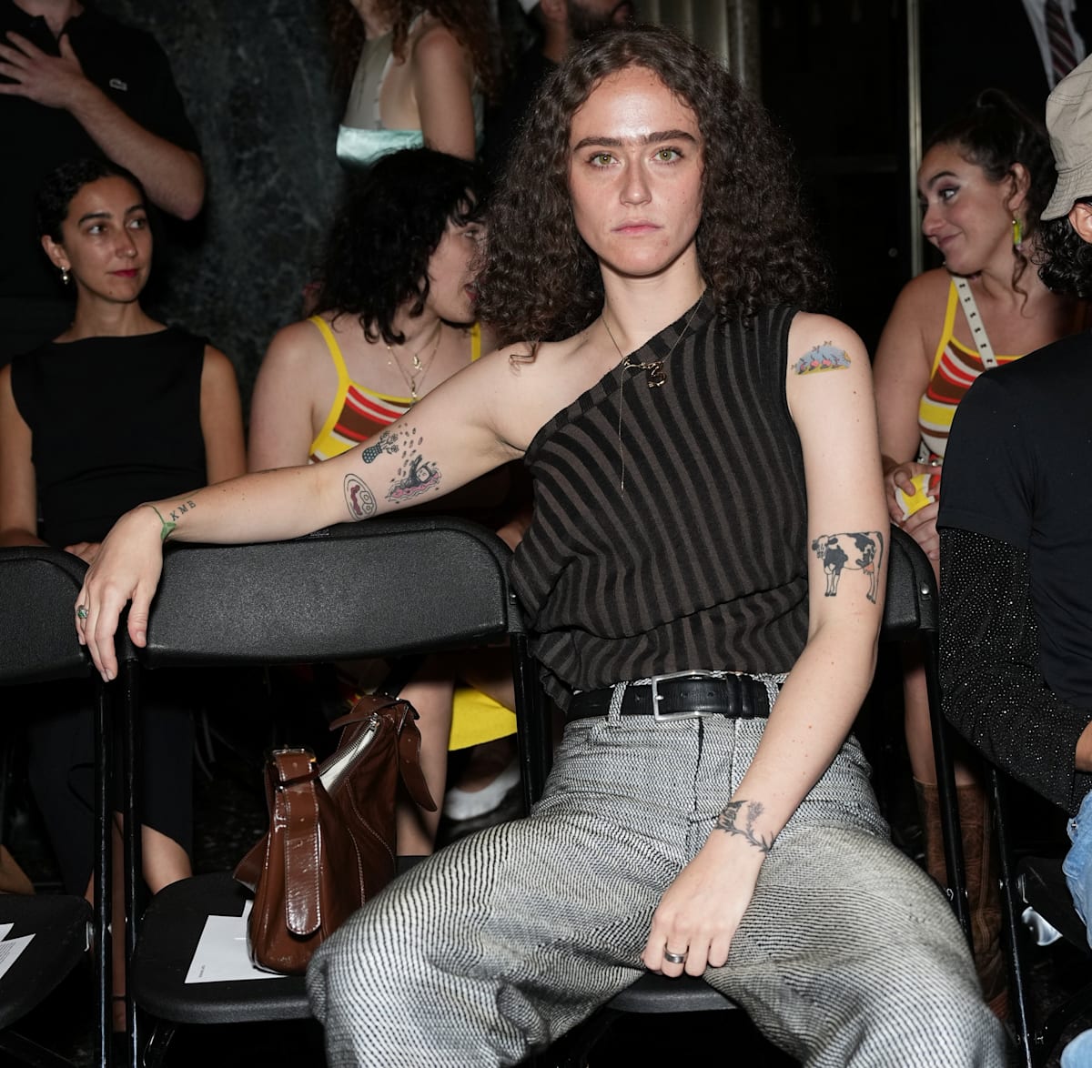 Describe Kamala's stepdaughter Ella Emhoff with ONE word.