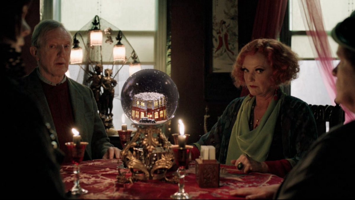 youryurigoddess's tweet photo. Good Omens fans trying to predict the show’s ending with Rob Wilkins’ snow globe, August 2025, colourised https://t.co/mYOQKMjwO6