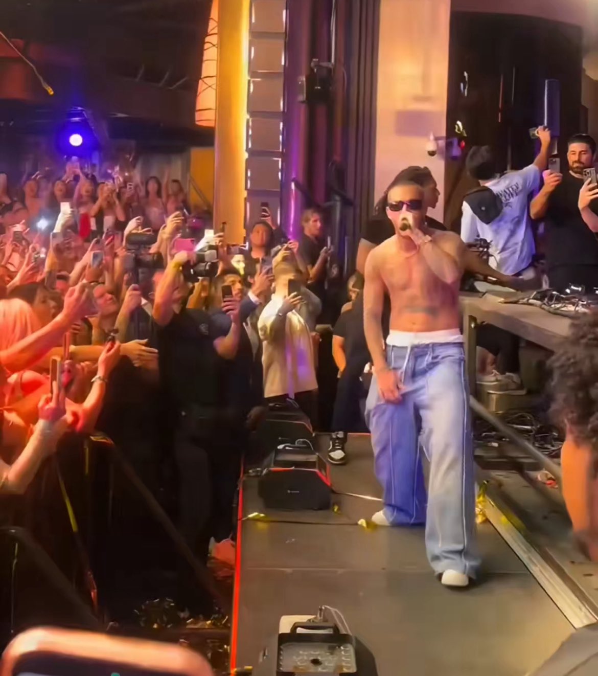 An aerial view of a field. A road runs through the upper right corner.