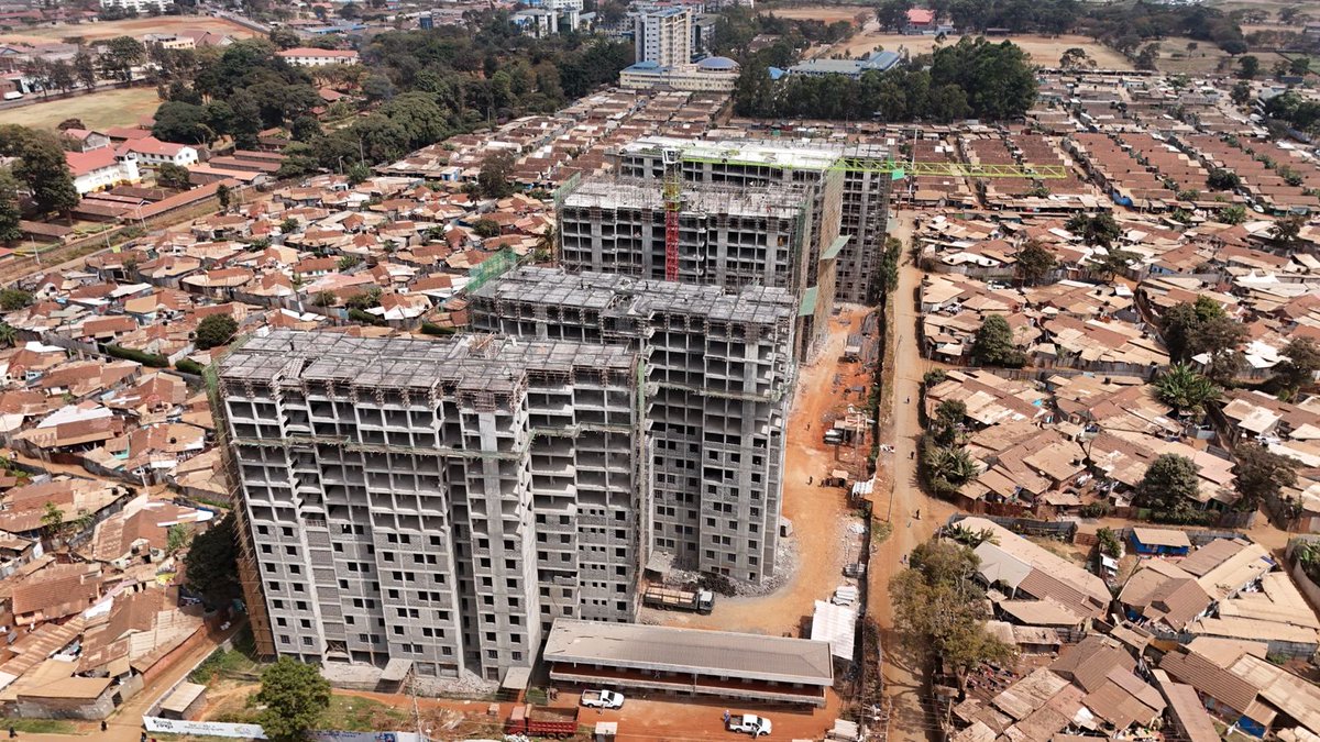 boma_yangu's tweet photo. Surrounded by informal settlements, the Thika Bustani Affordable Housing Project in Thika Town Constituency, Kiambu County, delivered through the State Department of Housing and Urban Development seeks to replace slum conditions with modern, dignified and affordable homes that uplift community livelihoods and transform the local landscape. 
Commenced in July 2024, the project features six residential blocks with a total of 931 housing units, offering a diverse mix to cater to different income brackets: bedsitters/studio apartments, one-bedroom units, two-bedroom (affordable, market and social categories) and three-bedroom (affordable, market and social categories). 
The blocks include A1 (G+15), A2 (G+15), B1 (G+14), B2 (G+14), B3 (G+14) and C (G+15). 
Amenities include eight retail shops within the residential blocks and a commercial block housing 16 additional shops, ensuring residents have access to essential goods and services within the estate.
Additionally, the project is a significant driver of economic activity in the area. It currently employs 266 people; 152 skilled workers, 104 unskilled labourers and 10 student trainees from local technical institutions, creating direct income opportunities and supporting numerous indirect jobs through supply chains and local enterprises.