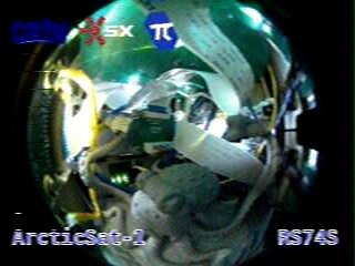 Merkouris SV2HWM (@sv2hwm) on Twitter photo 2025-08-8 19:35 UTC. Image received from the 🇷🇺 🛰️ ArcticSat-1 (RS74S) on 435.890 MHz, in Robot36 #SSTV mode. Rx with <a href="/airspy_com/">Airspy R2/Mini</a> Mini and turnstile antenna + LNA/BPF in 🇬🇷. Perfect image with the octopus figurine "OctoPax" clearly visible spacepi.space/_next/static/i… 2025-08-8 19:35 UTC. Image received from the 🇷🇺 🛰️ ArcticSat-1 (RS74S) on 435.890 MHz, in Robot36 #SSTV mode. Rx with <a href="/airspy_com/">Airspy R2/Mini</a> Mini and turnstile antenna + LNA/BPF in 🇬🇷. Perfect image with the octopus figurine "OctoPax" clearly visible spacepi.space/_next/static/i…