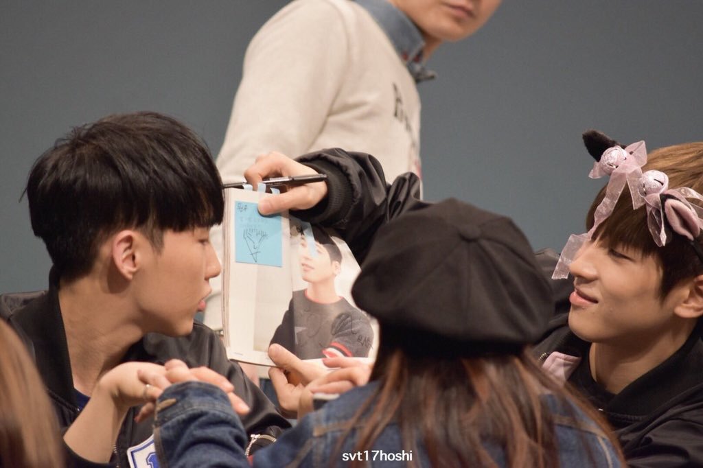 thinking about them (wonwoo in his pink bells interrupting hoshi's moment with a fan to compare his lil sticky note doodle of hoshi to the real thing)