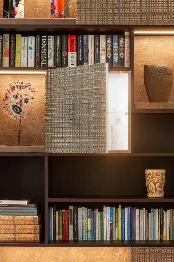 MateriaMiami's tweet photo. Custom bookcase combines the depth of wenge wood, the brilliance of Liquid Metal bronze, and the strength of leather niches. With doors adorned by Maxima carving and every detail crafted to perfection, it’s more than furniture—it’s an experience for both the eye and the touch. https://t.co/LtmMz2k7IA