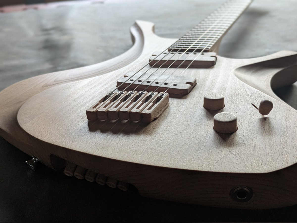 ヘッドレスギター - Search / X