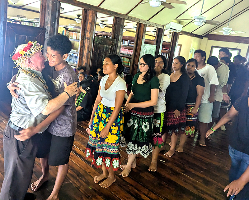 JesuitsEast's tweet photo. Fr. Richard McAuliff, SJ, was recently surprised with a celebration of his 30+ years of service to Catholic Education in Micronesia, especially as Director of Yap Catholic High School. Students, faculty, alumni, and friends from across Micronesia were on hand for the event. https://t.co/pgRVmh2IQJ