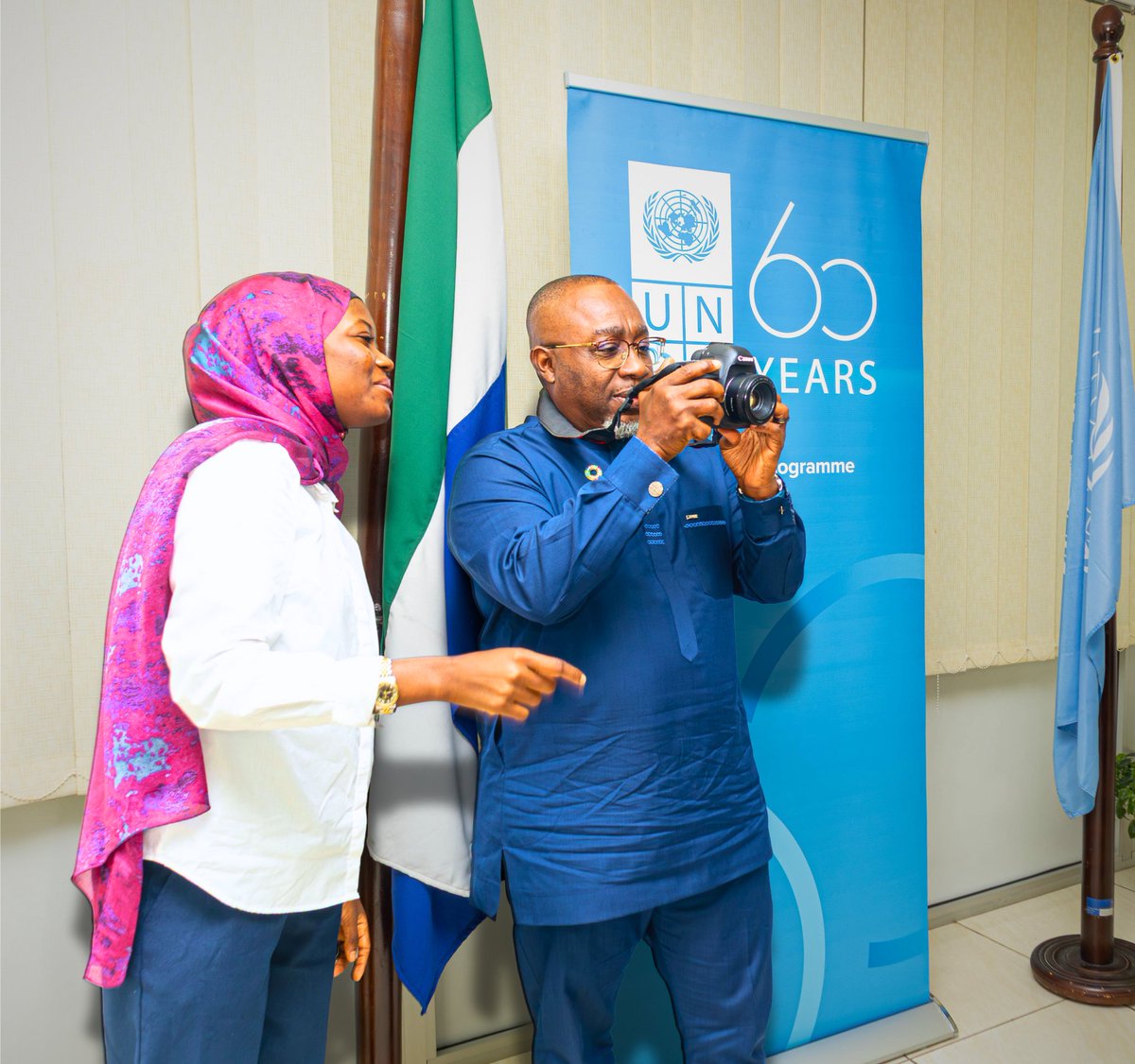 UNSierraLeone's tweet photo. 📷 On #WorldPhotographyDay, @UNDPSierraLeone Res. Rep. @FredAmpiah captures more than a moment!
Behind the lens, he captures staff at work—showcasing progress through people’s eyes and our commitment to learning & evidence-based development in Sierra Leone. 🇸🇱🇺🇳 #UNDPinAction https://t.co/UcJ5qhoPJQ