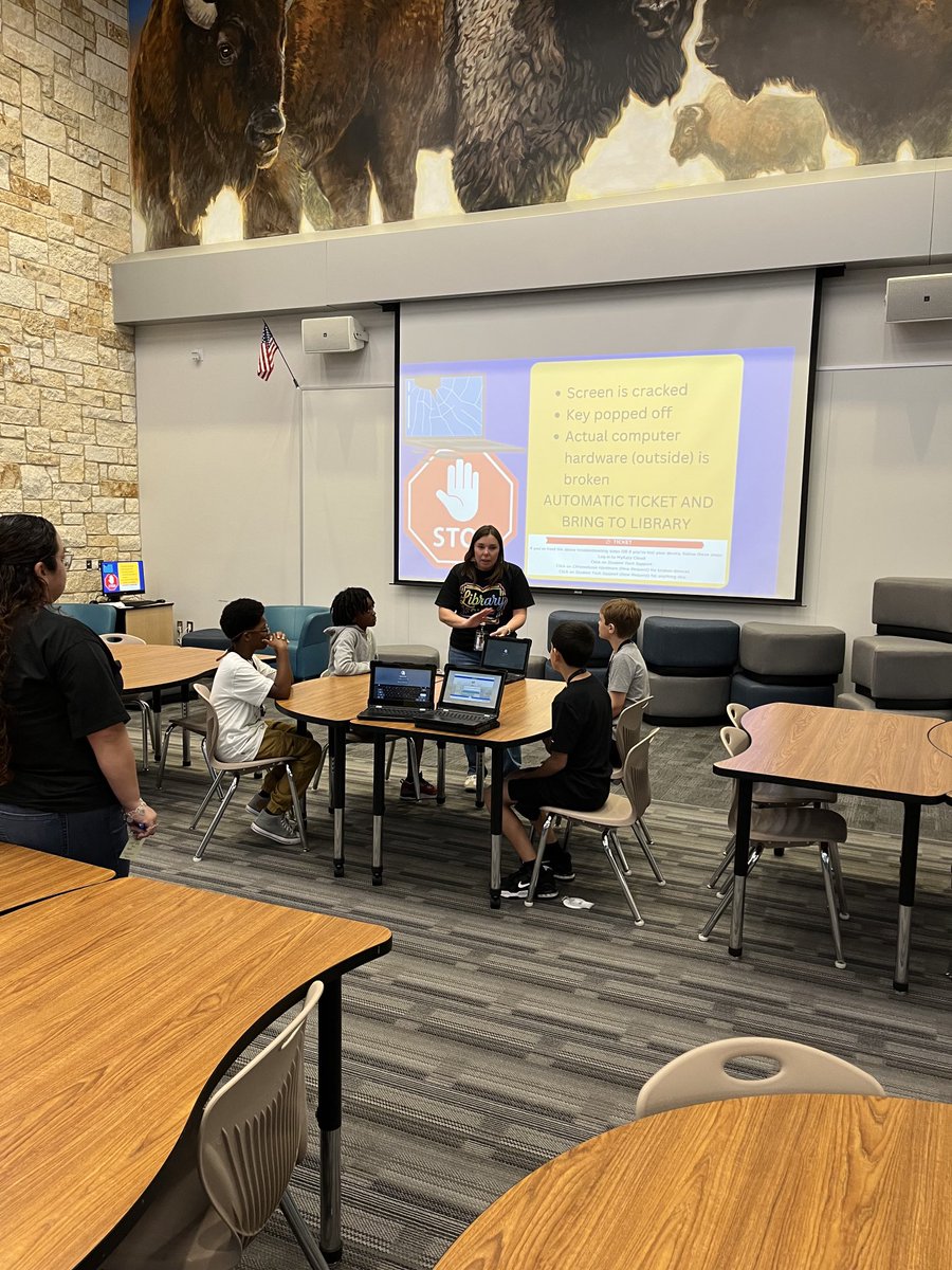 Mrs. Cortez, our librarian, training our 3rd, 4th, and 5th grade tech experts!