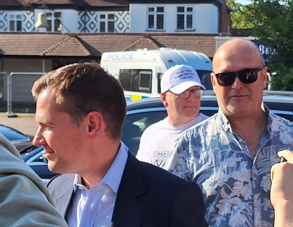 Robert Jenrick, seen here in Epping with Eddy Butler, a concerned parent, ex BNP activist and founder member of Nazi group Combat 18.