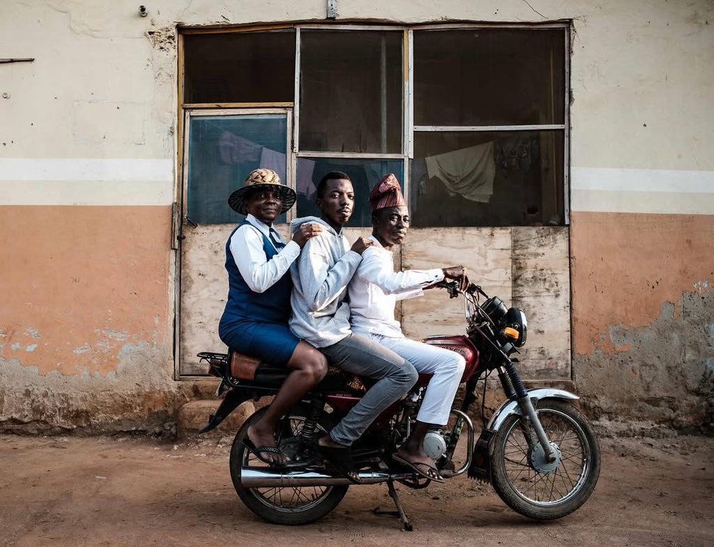 Ebi Olokada (2025)
📸 : <a href="/victoradewale_/">Ùjèsà omo ará ulé Ùwàrà</a> 

Ebi Olokada pays homage to the riders who have carried the city (Lagos) for decades. For Victor it’s personal his father was once an Okada rider. This project is both memory and tribute, turning what was once seen as shame into pride.