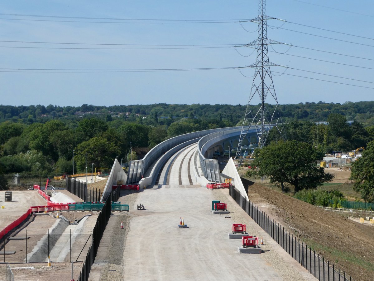 RailNutter's tweet image. The eastern (city) end of the #HS2 Colne Valley Viaduct on 17 August, seen from Harvil Road and (last picture) the Chilterns main line. The track bed is all smoothed and ready to lay the rails...