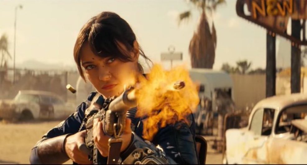 hosiesheaven's tweet photo. there is just something about a woman with a gun https://t.co/vfzrqGUOSI