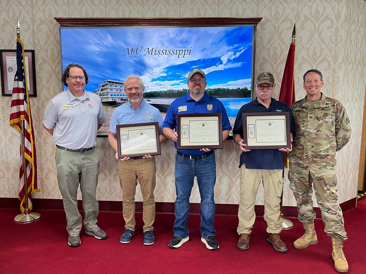 Col. Andy Pannier presented Public Service Commendation Medals to Matt Vitello, Matt Mangan and Butch Atwood for exceptional partnership in advancing navigation and ecosystem restoration missions on the Mississippi River.