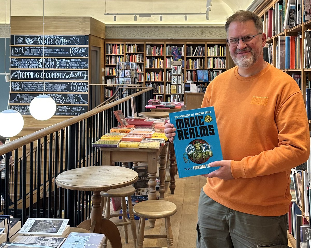 jonathangreen's tweet photo. It was great to see a copy of MAGIC REALMS in @ToppingsBath today, along with a whole shelf of gamebooks! I also bought a book to add to my reference library. #MagicRealms #gamebooks #ToppingsBath #MatthewRice https://t.co/YQqmKzeBVc