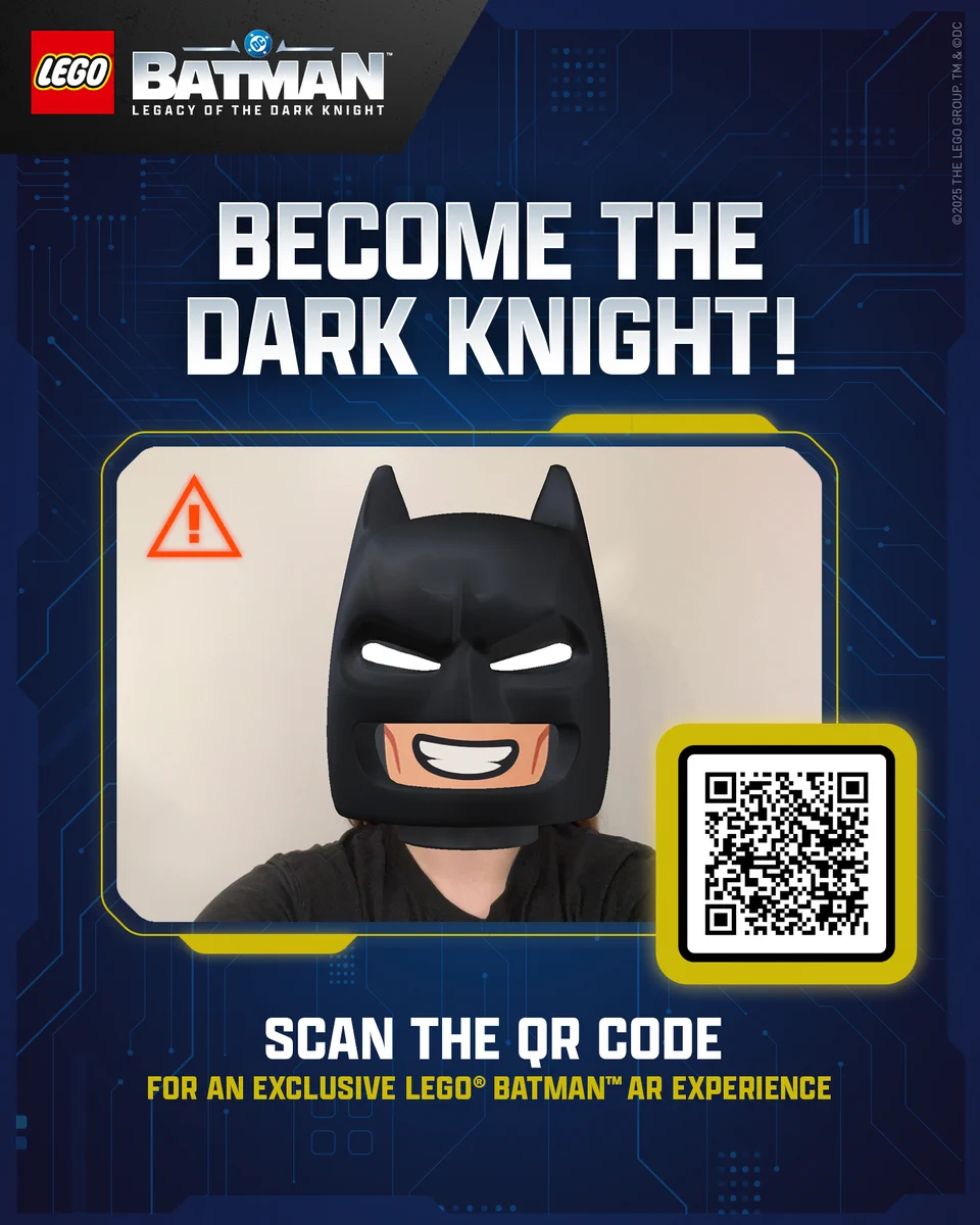 Promotional poster for LEGO Batman: Legacy of the Dark Knight featuring a LEGO Batman mask over a person's face with the text "Become the Dark Knight" and an invitation to scan a QR code for an exclusive LEGO Batman AR experience.