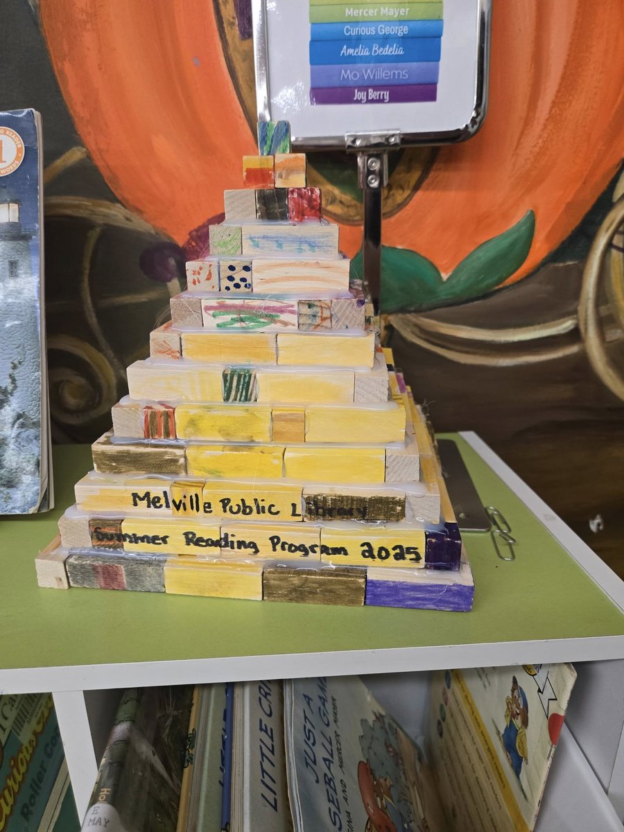MelvilleLibrary's tweet photo. Our pyramid is complete! 
Our 4–7 year olds worked hard colouring blocks to help build this amazing pyramid, and now it’s proudly on display at the Melville Public Library! 
Come see it in person and admire their creativity — but please remember, it’s a display only. https://t.co/Lh1ux3fKYZ