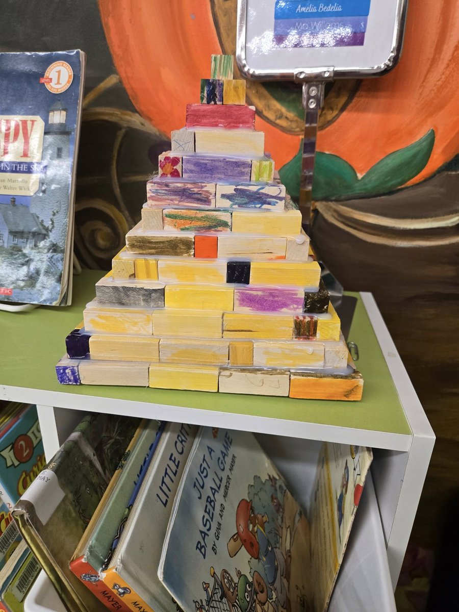 MelvilleLibrary's tweet photo. Our pyramid is complete! 
Our 4–7 year olds worked hard colouring blocks to help build this amazing pyramid, and now it’s proudly on display at the Melville Public Library! 
Come see it in person and admire their creativity — but please remember, it’s a display only. https://t.co/Lh1ux3fKYZ