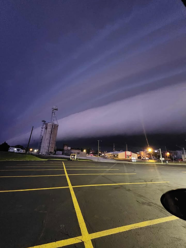 Holy cow, look at this picture!  It looks like something out of a movie.  It was taken this morning in Brazil by Pete Coleman.  That's another picture of what we call a Roll Cloud.