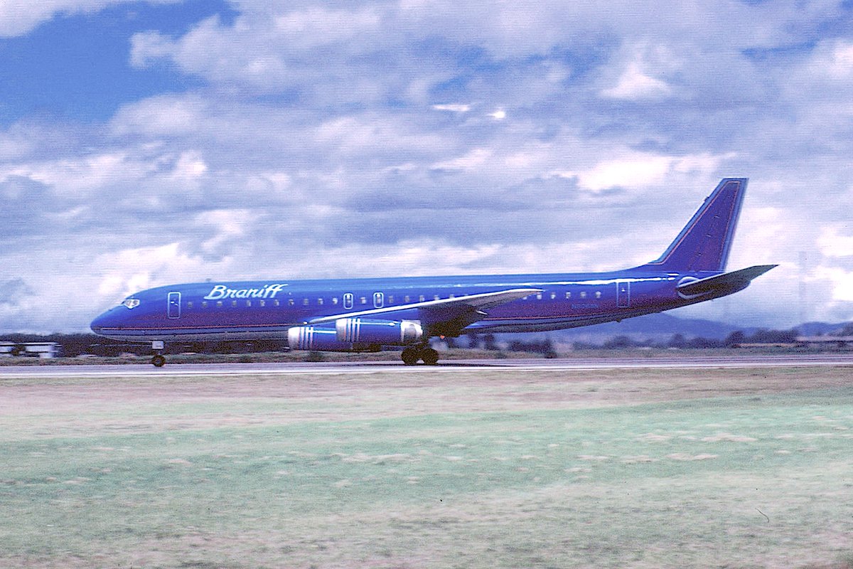 BRANIFF IN SOUTH AMERICA THE COLLECTION OF J. ESCOBAR - Braniff International McDonnell Douglas DC-8-62 Ultra Space Jet registered as N806BN is taxiing at Bogota El Dorado Airport, Colombia, in August 1980. Ship N806BN is painted in the 1978 Harper and George/Cars and