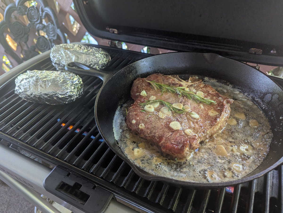 Boogie wanted steak for dinner ha. I told her if she bought a steak I would make her a rosemary garlic butter steak and potatoes. Cast iron pan on the grill for a seer then butter rosemary and garlic braise