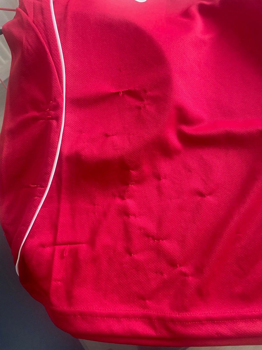 Isalotro's tweet photo. @LFCHelp Ive raised a complaint about the shirt quality but Im raising here too for vis as lots of others are doing same/
Supp services say they cant do anything as tags removed (ofc they are, waited weeks for his shirt) but 2 hours wear and it looks like this https://t.co/U0gjC9O9lL