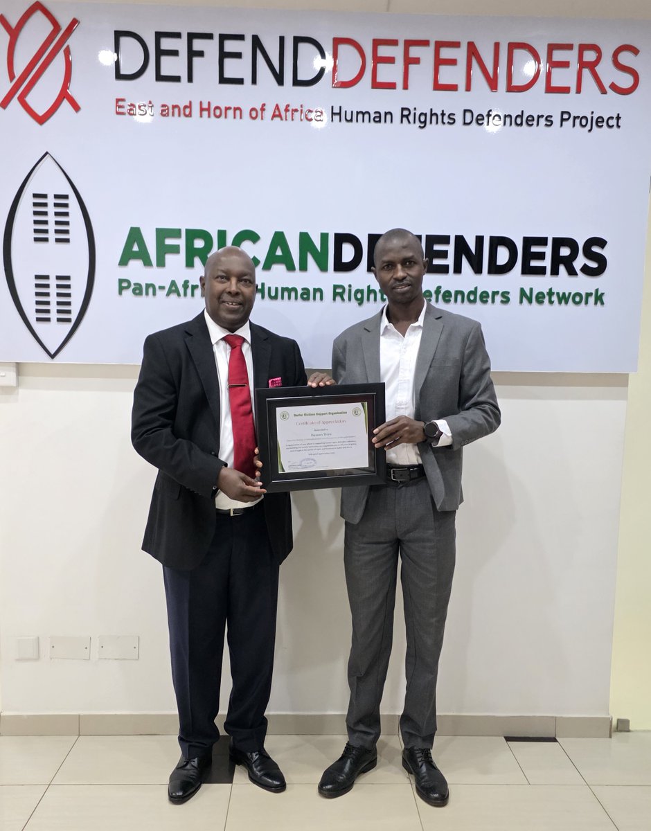 DVSorg's tweet photo. Darfur Victim Support Organization Honors DefendDefenders for 20 Years of Advocacy.

August 19, 2025 – Kampala, Uganda

On Tuesday, the Darfur Victim Support Organization (DVSO) paid a celebratory visit to the offices of DefendDefenders, marking a significant milestone in the latter’s two-decade journey of protecting and empowering Human Rights Defenders (HRDs) across Africa. The occasion commemorated 20 years of unwavering support, with special recognition given to DefendDefenders’ contributions to Sudanese HRDs and civil society organizations.
DVSO presented certificates of appreciation to DefendDefenders acknowledging their deep and sustained partnership. Over the years, DefendDefenders has provided DVSO with vital technical assistance, capacity-building programs, and financial support, enabling the organization to expand its reach and impact in conflict-affected regions.
The celebration also highlighted DefendDefenders’ instrumental role in advocating for the renewal of the mandate of the UN Fact-Finding Mission (FFM) on Sudan, established in Geneva to investigate atrocities committed during the ongoing conflict. Their efforts through the African Commission on Human and Peoples’ Rights have further amplified the voices of victims and defenders alike.
DVSO extended heartfelt thanks to DefendDefenders’ founder, Mr. Hassan Shire, and his dedicated team, including Sudan Coordination lead Majid and his colleagues. Their commitment to justice and human dignity continues to inspire grassroots movements across the continent.
This event served not only as a tribute to past achievements but also as a reaffirmation of solidarity in the ongoing struggle for human rights and accountability in Sudan and beyond.
August 19, 2025 – Kampala, Uganda
On Tuesday, the Darfur Victim Support Organization (DVSO) paid a celebratory visit to the offices of DefendDefenders, marking a significant milestone in the latter’s two-decade journey of protecting and empowering Human Rights Defenders (HRDs) across Africa. The occasion commemorated 20 years of unwavering support, with special recognition given to DefendDefenders’ contributions to Sudanese HRDs and civil society organizations.
DVSO presented certificates of appreciation to DefendDefenders acknowledging their deep and sustained partnership. Over the years, DefendDefenders has provided DVSO with vital technical assistance, capacity-building programs, and financial support, enabling the organization to expand its reach and impact in conflict-affected regions.
The celebration also highlighted DefendDefenders’ instrumental role in advocating for the renewal of the mandate of the UN Fact-Finding Mission (FFM) on Sudan, established in Geneva to investigate atrocities committed during the ongoing conflict. Their efforts through the African Commission on Human and Peoples’ Rights have further amplified the voices of victims and defenders alike.
DVSO extended heartfelt thanks to DefendDefenders’ founder, Mr. Hassan Shire, and his dedicated team, including Sudan Coordination lead Majid and his colleagues. Their commitment to justice and human dignity continues to inspire grassroots movements across the continent.
This event served not only as a tribute to past achievements but also as a reaffirmation of solidarity in the ongoing struggle for human rights and accountability in Sudan and beyond.