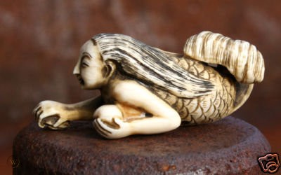 NINGYO NETSUKE 
Exquisite miniature Japanese sculptures of human-fish hybrids or Ningyō 人魚. Associated with floods or catastrophe if caught, they are also said to bring good fortune &amp; immortality when consumed. #gothicmermaids #seachanges