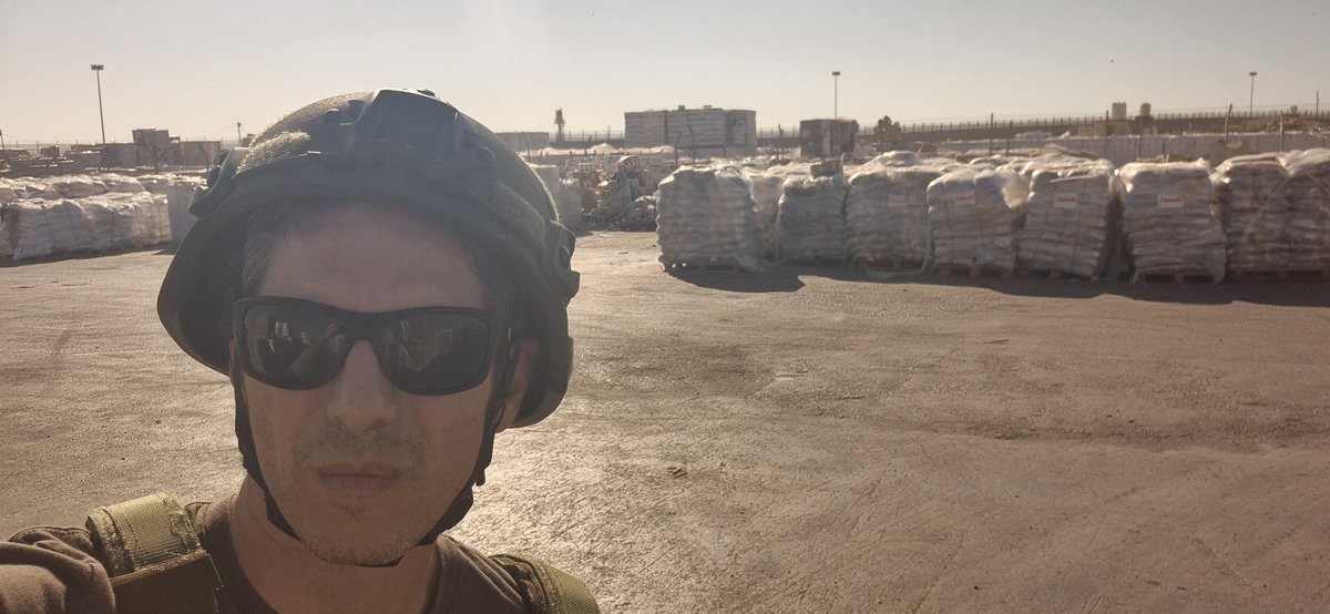 A single image can't do justice the amount of aid sitting here waiting for the UN to pick up.