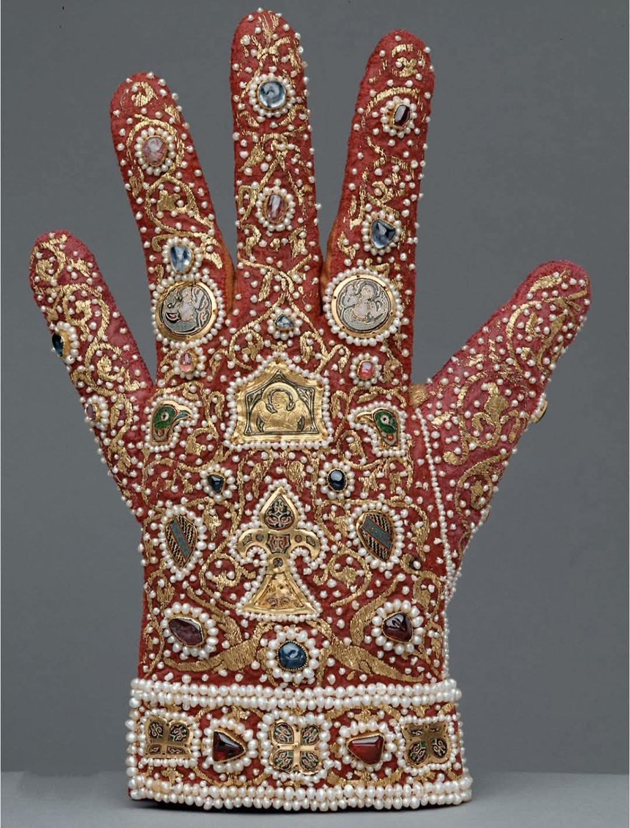 Federico II glove, with gold inserts, pearls and precious stones. Made in Palermo before 1220 CE.

Federico II was a patron of the arts and sciences. His court in Palermo became a state-of-the-art cultural centre, attended by poets, scientists and philosophers. 

In 1224 CE, he