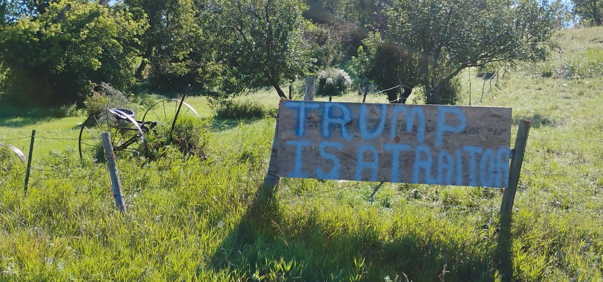Homemade sign, minimum maintenance road, Roberts County South Dakota.
