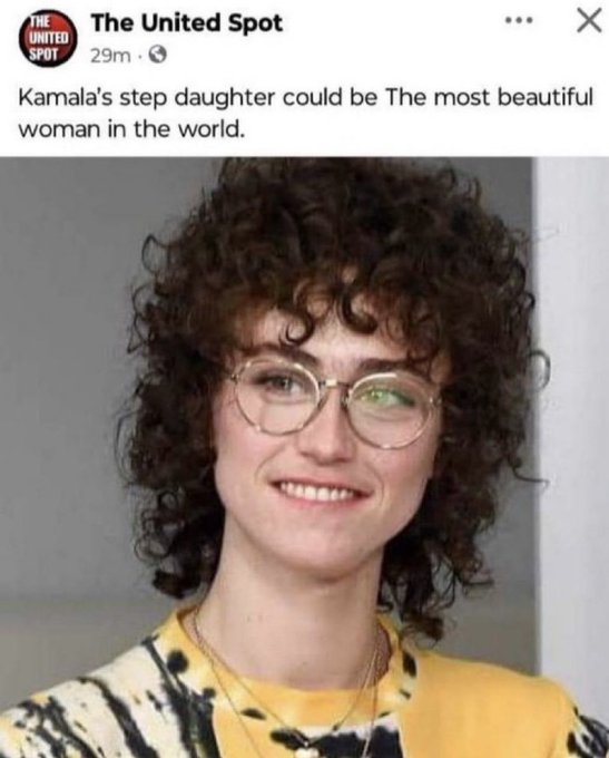 A person with curly brown hair and glasses, wearing a yellow shirt and a tie-dye jacket, smiling at the camera. A circular logo with "The United Spot" and text reading "Kamala\'s step daughter could be The most beautiful woman in the world" is visible in the top left corner.