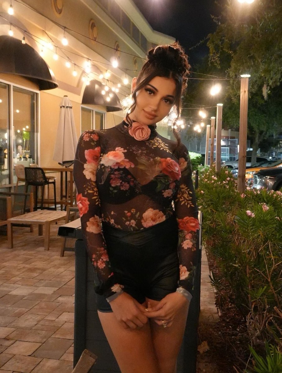 skyes_gracee's tweet image. she's just a girl with her little rose necklace and cute head tilt 😗