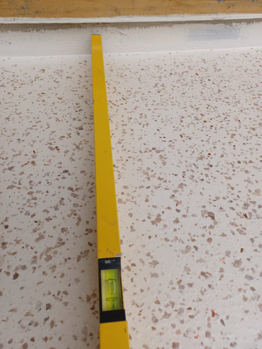 Even when there is slope the water can flow easy to the drains after the Paraffin had been removed from the surface. More info: plastifloor.net